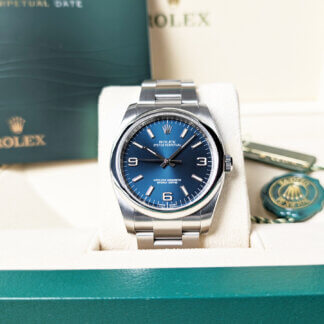 Rolex Oyster Perpetual Blue Dial 116000 | 36mm | The Watch Buyers Group